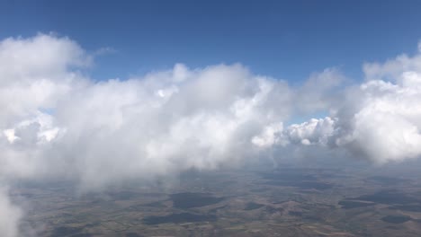 aerial view of clouds and landscape