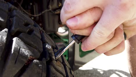 Plugging-an-hole-in-a-lawn-mower-tire