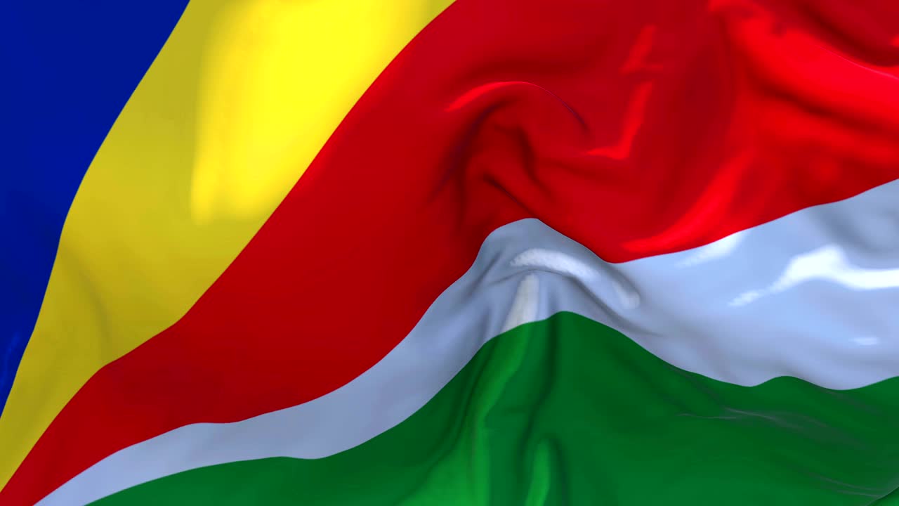 Seychelles Flag Waving in Wind Slow Motion Animation . 4K Realistic Fabric Texture Flag Smooth Blowing on a windy day Continuous Seamless Loop Background.