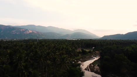 Cam-Ranh-vietnam-small-remote-village-with-unpolluted-mountains-landscape-jungle-rainforest-and-small-water-stream-river-in-asia