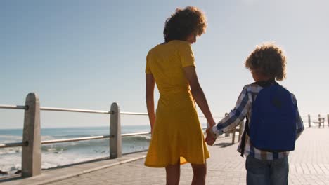mother and son spending time together at beach