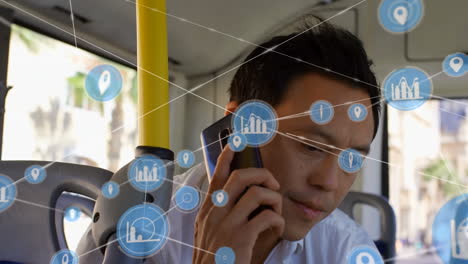 animation of network of connections over asian man talking on smartphone in bus