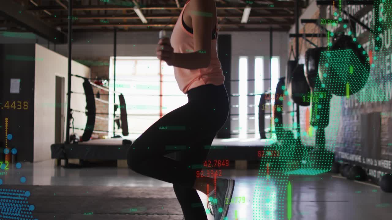 Trainee starting hops in gym fitness, animated candlestick chart sliding over legs as camera rising