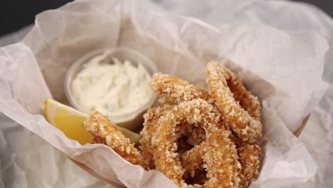 crispy fried calamari with lemon and sauce