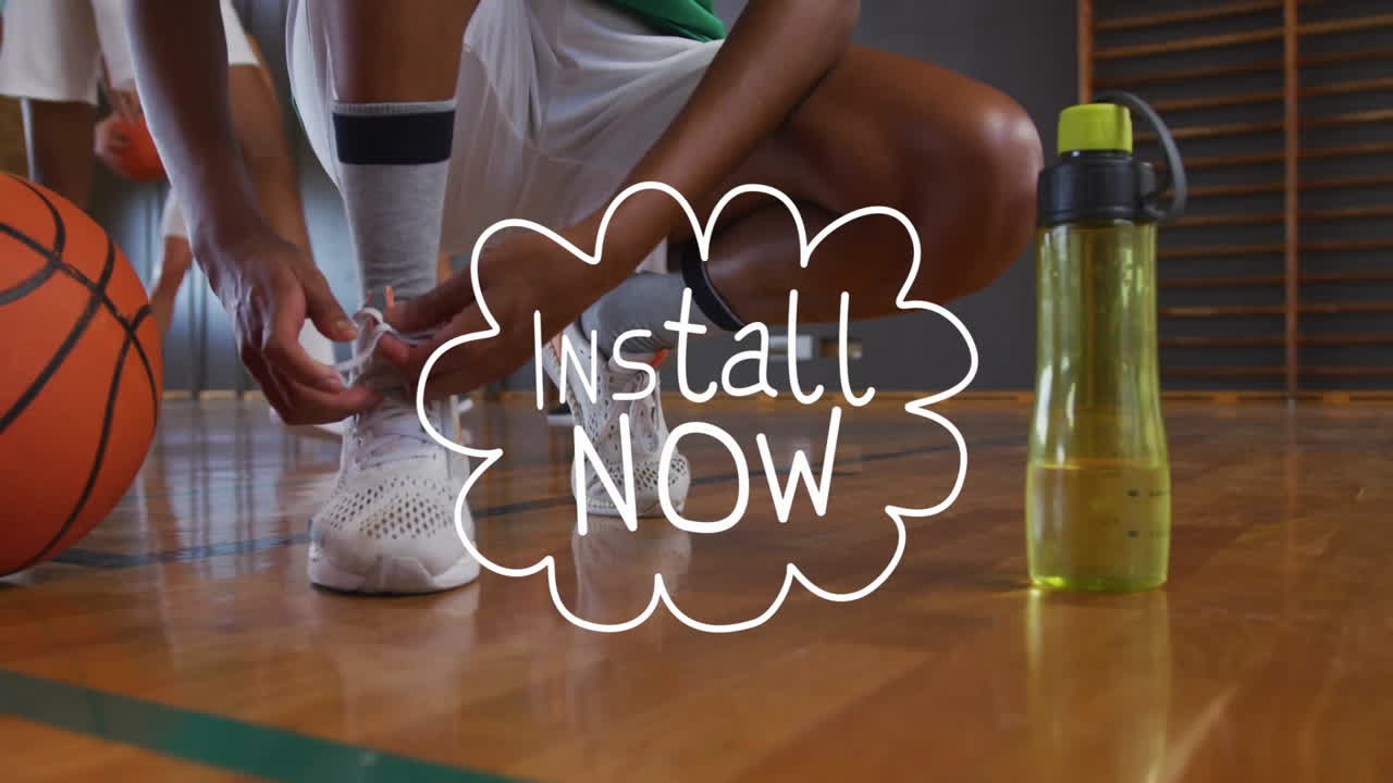 Basketball player tying shoes with animation text on water bottle in gym