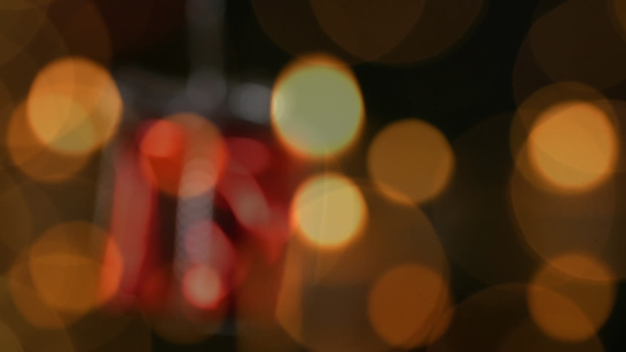 animación de velas sobre el regalo de navidad