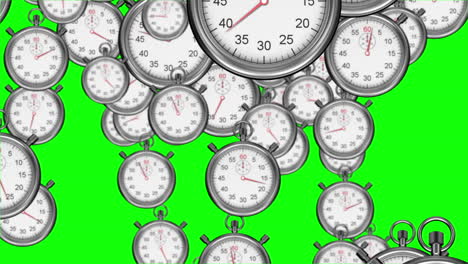 Stopwatches-falling-on-green-background