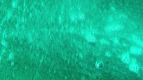 teal liquid with bubbles