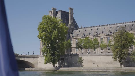 Exterior-Of-Hotel-De-Ville-In-Paris-France-Shot-From-River-Seine-In-Slow-Motion