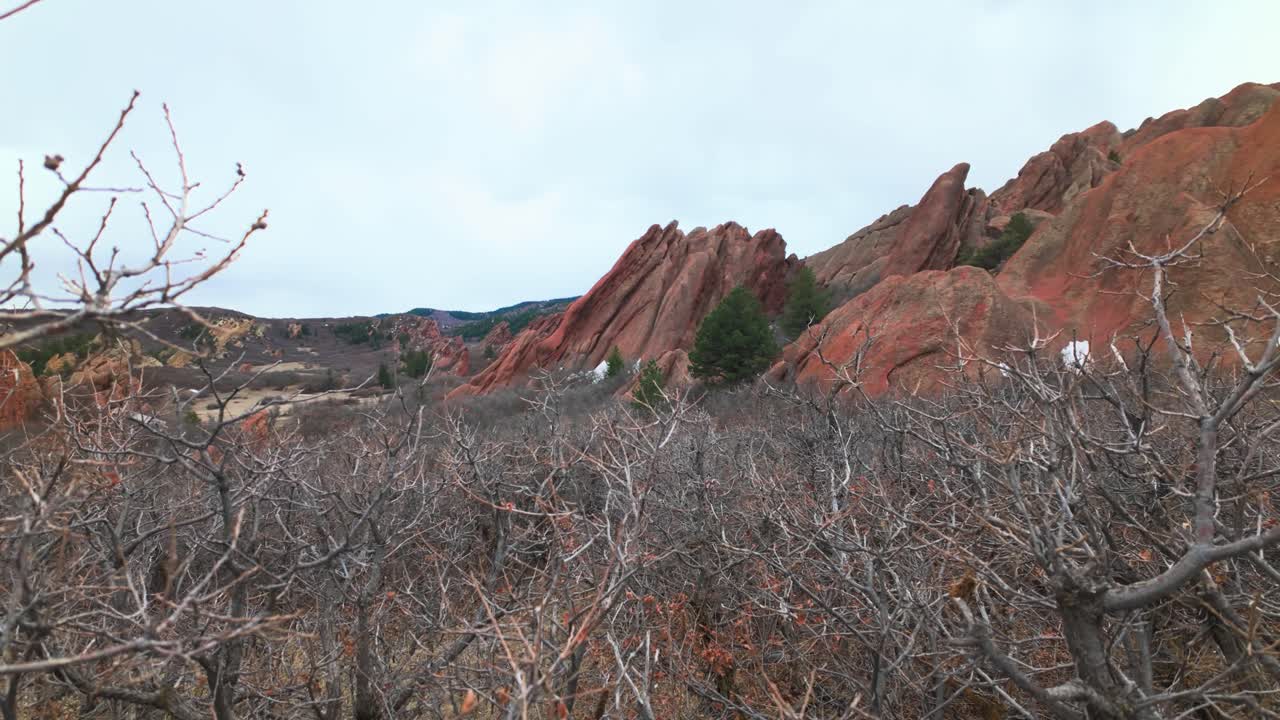 Red Sandstone Formations With Bare Trees In Foreground. Roxborough State Park In Colorado, USA. wide shot