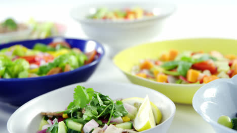 variation of salads in bowl