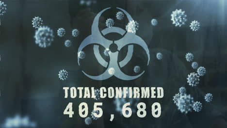 animation of biohazard symbol and total confirmed number with virus cells over caucasian woman