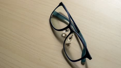 explore the sleek design of stylish glasses captured in a serene home office setting.