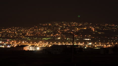 Timelapse-of-night-city-lights-and-coming-morning