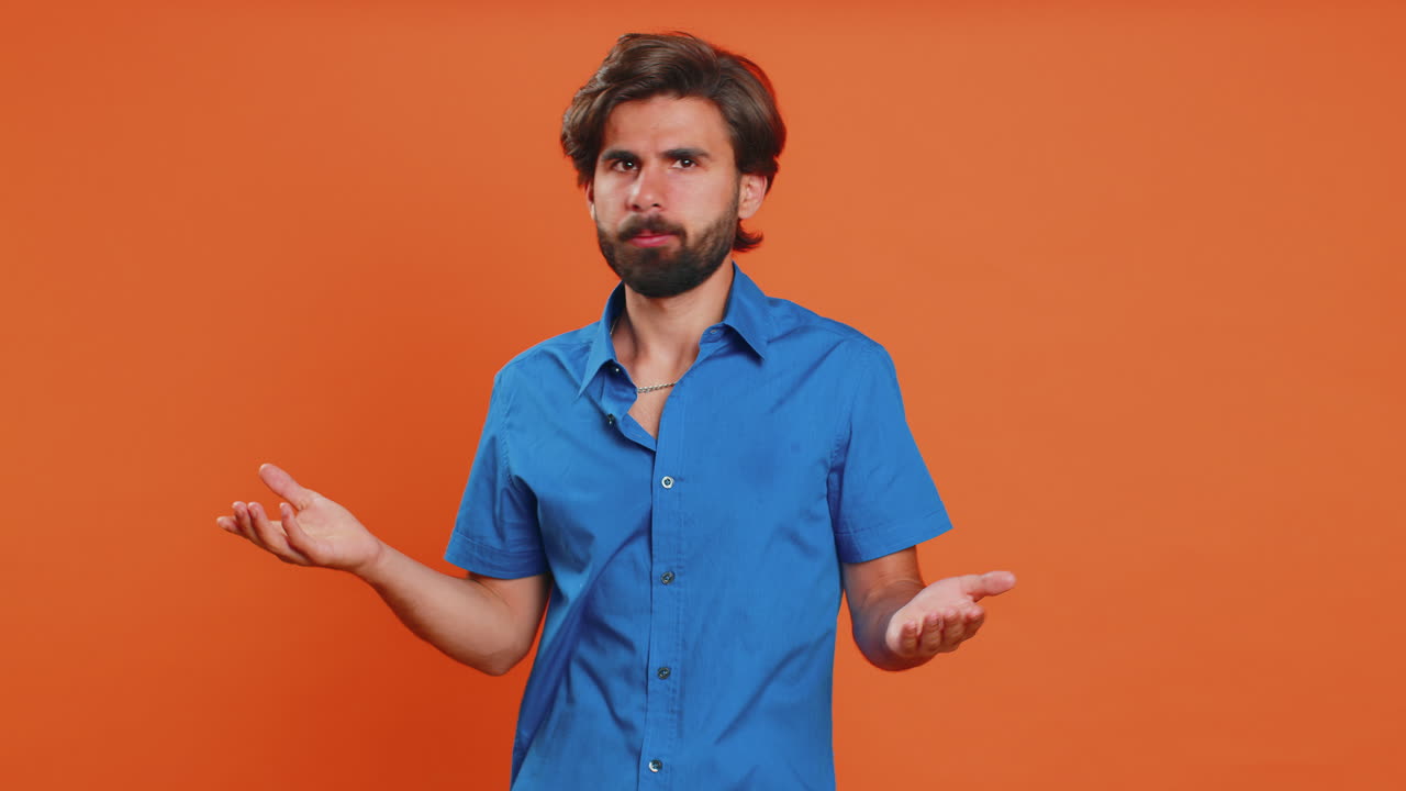 Young man making face palm gesture feeling bored disappointed in result bad news sorrowful