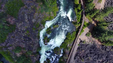 birdseye view, whitewater river, clear, sunny day in 4k 60fps frame rate