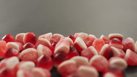 close up of halloween candy corn with copy space on grey background