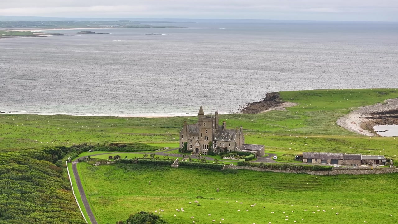 Historic Castle building on Sligo coastal. Typical Irish weather on seaside. Drone