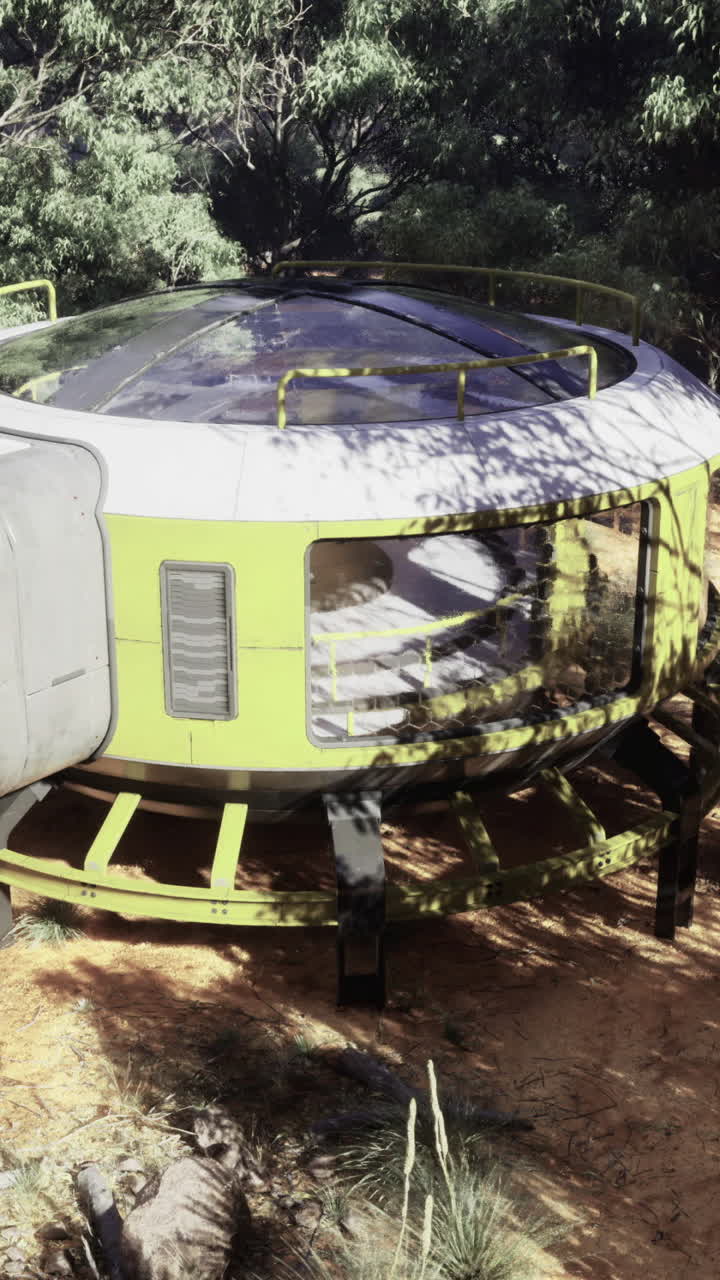 Futuristic habitat situated in a remote forested area during daylight