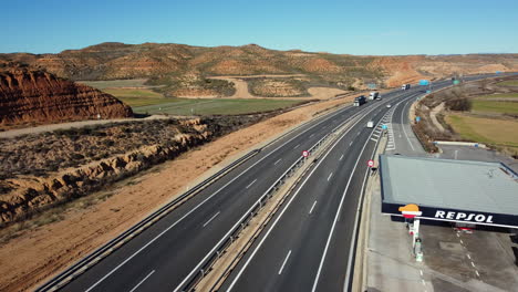 highway with gas station and countryside view
