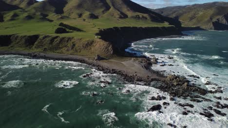 flying towards tongue point, wellington south coast, new zealand