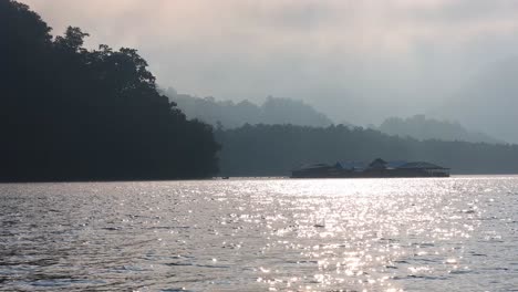 sunrise over a tranquil forested lake