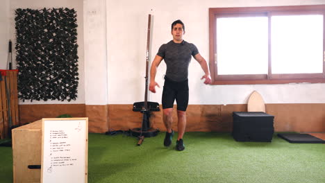 trainer performing exercise routine during online class stride front and back