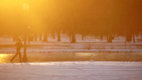 runner against a background of warm light, slow motion