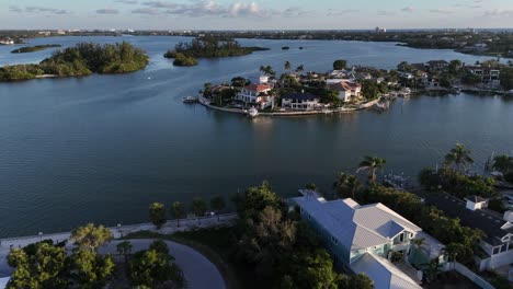 exciting rapid aerial swing over the magnificent Siesta Key bay and luxury homes on the island of Siesta Key, Florida