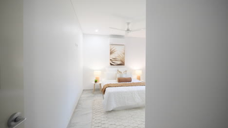 minimal bedroom with large windows filling the room with natural light