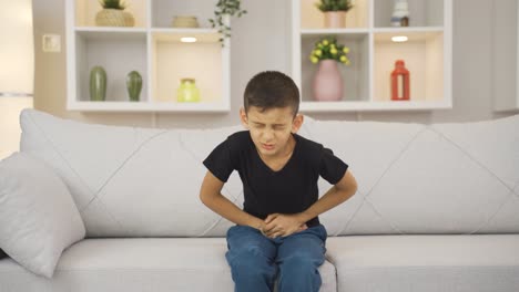 boy with stomach ache is suffering.