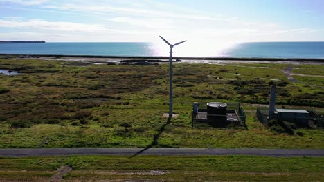 Aerial-static-of-Wind-Turbine-making-renewable-energy-in-Waterford,-Ireland