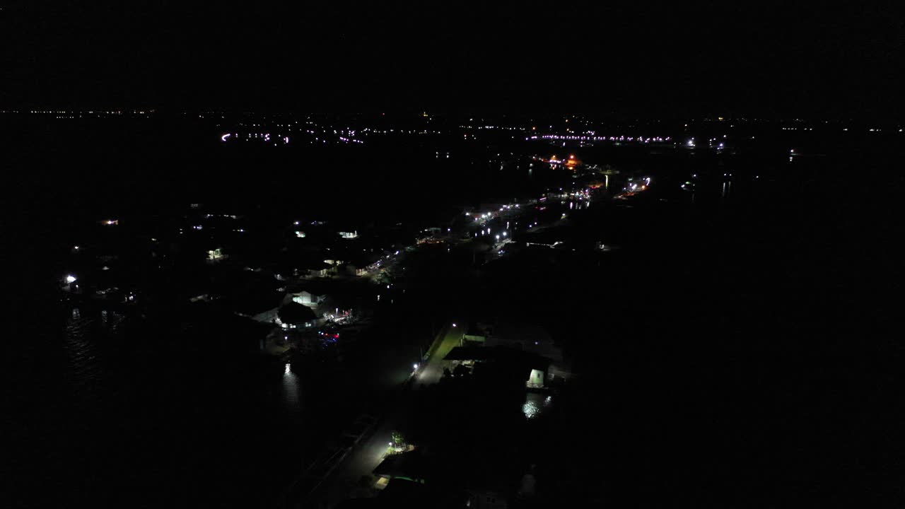 Night Aerial View of a City by a River