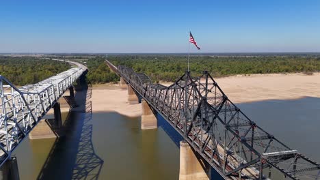 Railroad-bridge-with-American-Flag-waving-over-Mississippi-River-at-Vicksburg-Mississippi