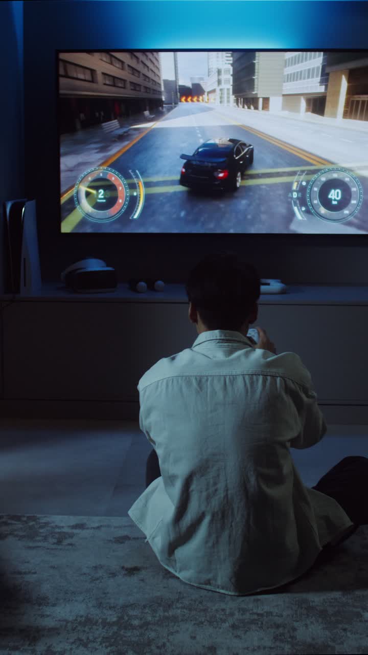Man playing video games at home
