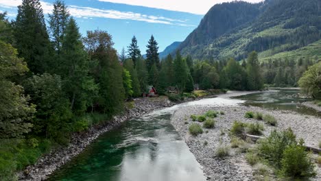 Drone-view-of-the-Skykomish-river-flowing-through-Baring,-Washington