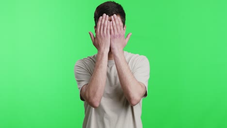 man covering ears