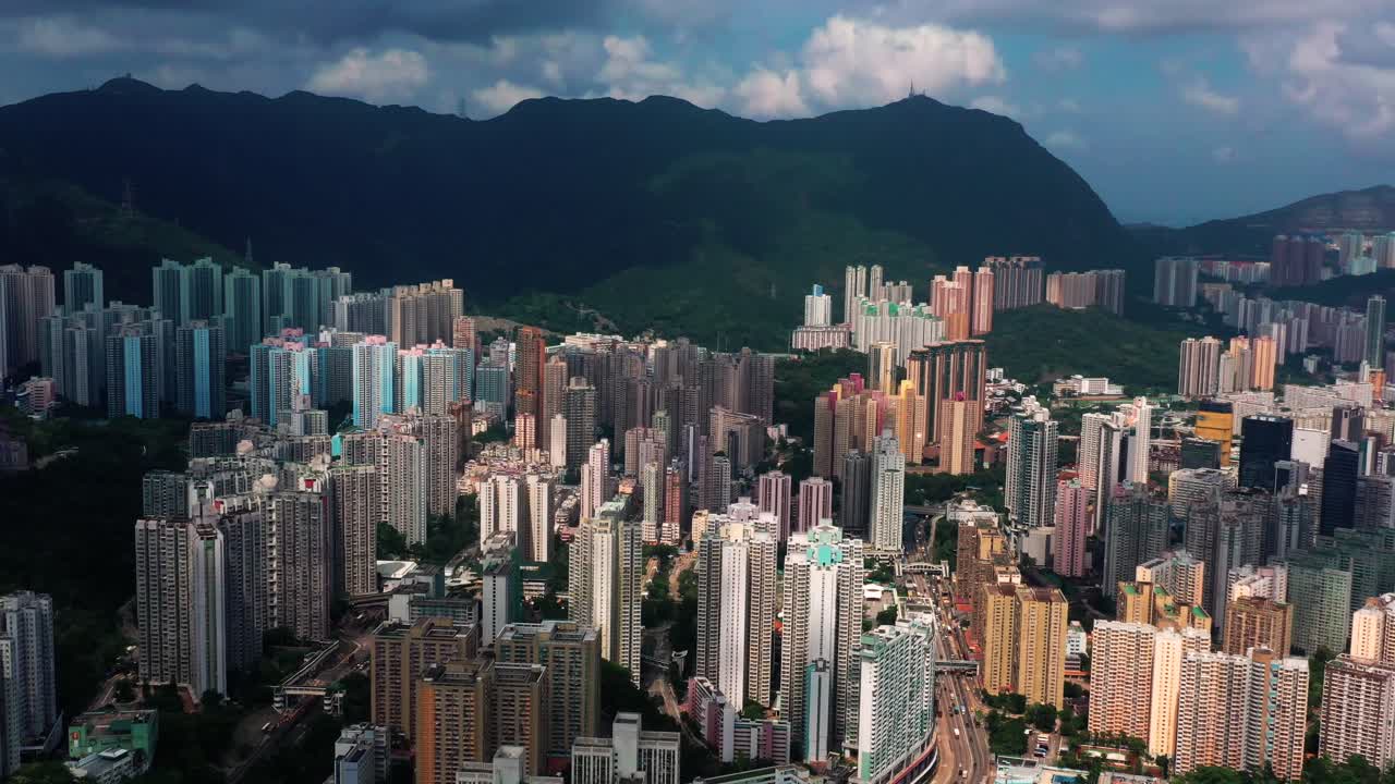 Aerial shot of general Hong Kong covering the premium residential area at mid level and the central business along the sides of the harbor. Kowloon Hong Kong.