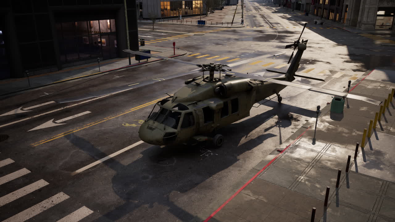 военный вертолет приземляется на городской улице.