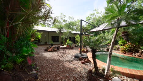 rural tropical rock garden with large pool and garden area