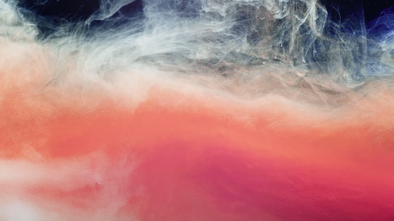 Abstract forms. Shooting on a black background. Mixing of paints