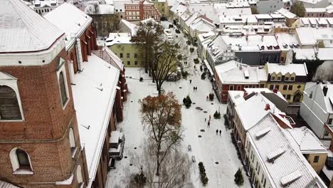 kaunas old town with bell tower of cathedral in winter season, aerial drone view