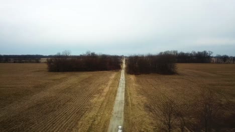 aerial view of narrowed countryside off road leading to the city of westfield in hamilton county, indiana