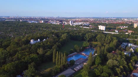 stunning aerial top view flight berlin city public swimming pool germany in europe, summer day 2023