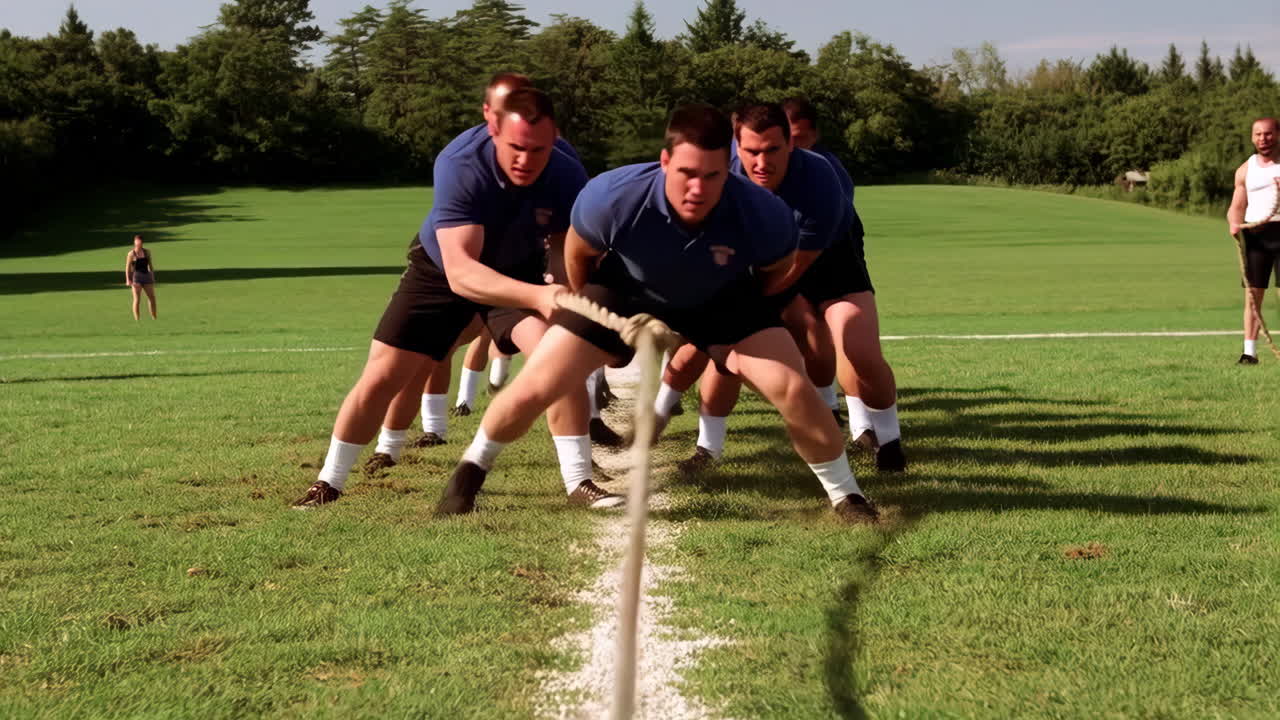 Men Competing in a Tug-of-War Competition