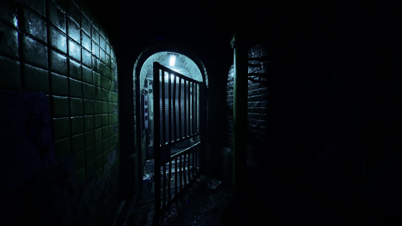 Dark corridor with a gate and eerie lighting in an abandoned building