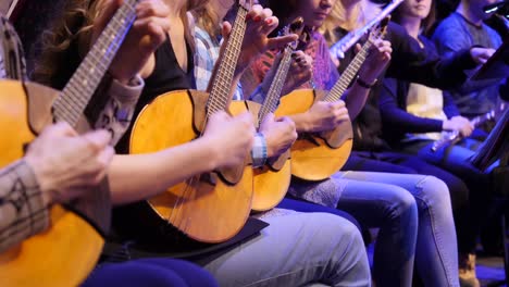 people playing domras in an orchestra