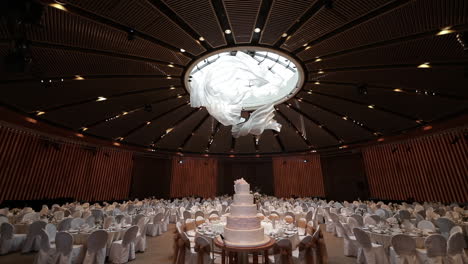 large luxury wedding reception venue with wedding cake