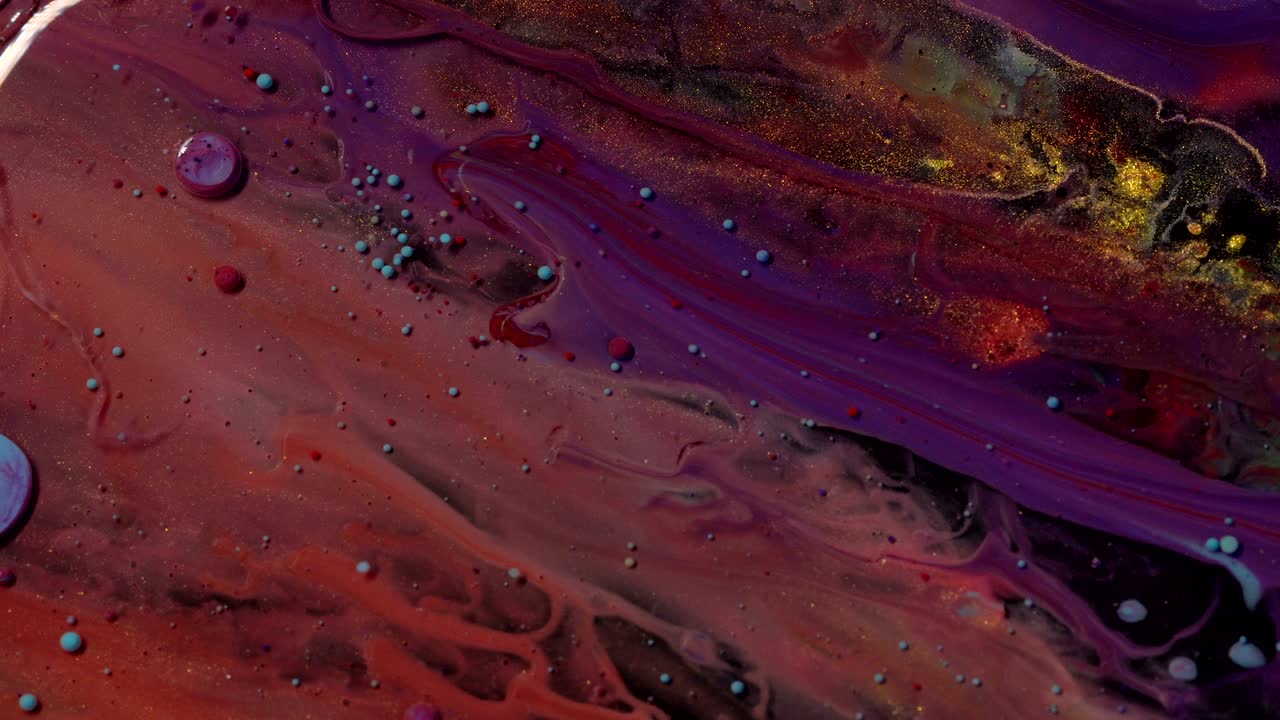 burbujas de pintura abstractas y coloridas en acción. vista superior, de cerca. disparo macro. colores en movimiento.