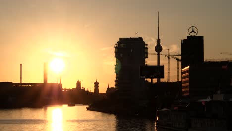 silhouetted berlin skyline at sunset